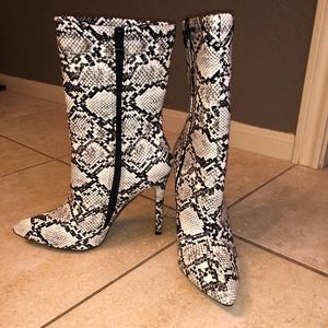 Calf high snakeskin boots
